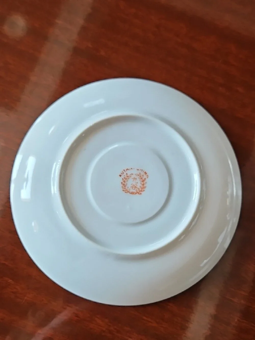 Vintage Porcelain Teacup & Saucer Set in White with Blue and Tan Accents